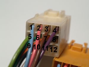 Female 12 pin AMP UP connector with pin numbering.